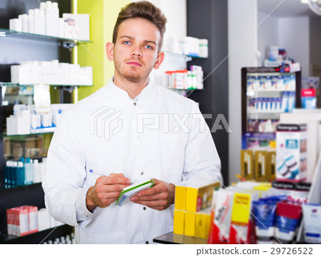 Pharmacist working in pharmaceutical shop Pharmacist working in pharmaceutical shop 29726522