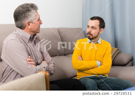 Adult father and son solve problems Adult father and son solve problems 29728531