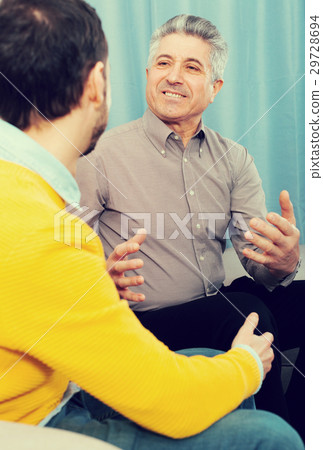 Adult father and son friendly conversation Adult father and son friendly conversation 29728694