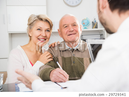 Old man and woman in social department Old man and woman in social department 29729341