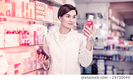 Female pharmacist suggesting useful body care products 29730049
