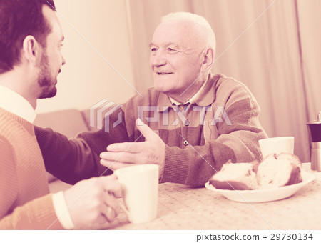 Elderly father and son breakfast Elderly father and son breakfast 29730134