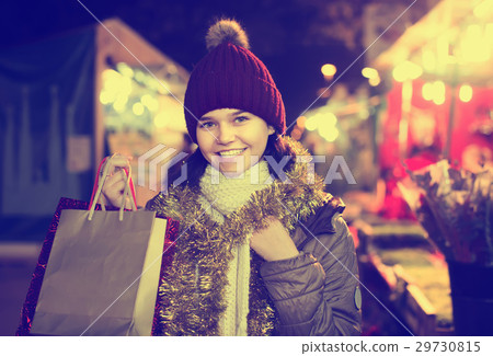Pretty young smiling girl at Christmas fair 29730815