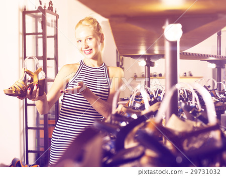 female customer choosing shoe female customer choosing shoe 29731032