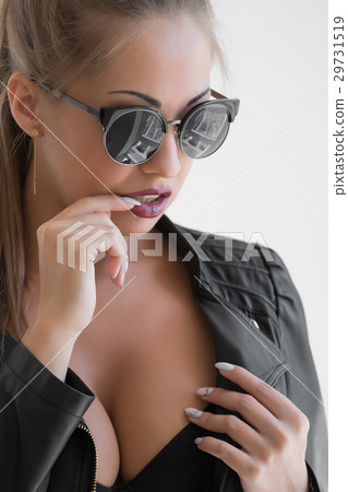 Young beautiful girl in black glasses with dark Young beautiful girl in black glasses with dark 29731519