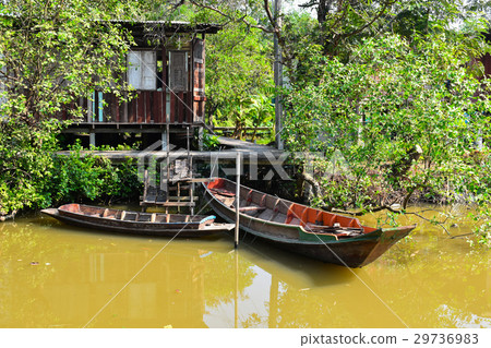 country house style in the garden beside river  29736983