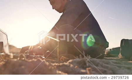 Freelancer. Man silhouette working on laptop Freelancer. Man silhouette working on laptop 29739726