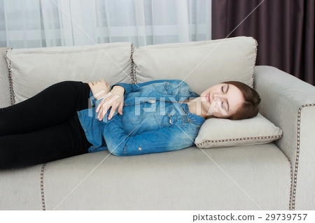 Beautiful woman In black pants and a blue shirt 29739757