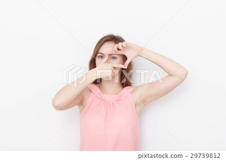 Young casual woman In pink blouse isolated over Young casual woman In pink blouse isolated over 29739812