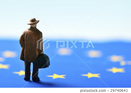 miniature traveler man and european union flag 29740641