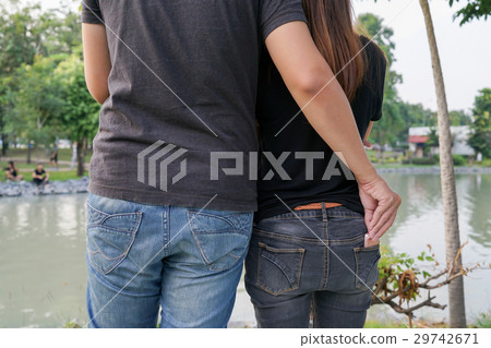 Man pretend to hug woman for stealing smart phone 29742671