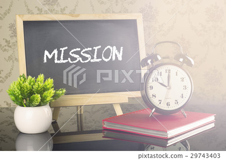Mission on blackboard with clock and flare Mission on blackboard with clock and flare 29743403