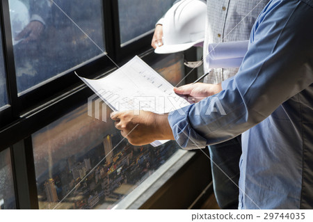 Architect discuss with engineer about project  29744035