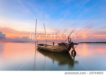 The remains of ancient ships in sunset 29744605