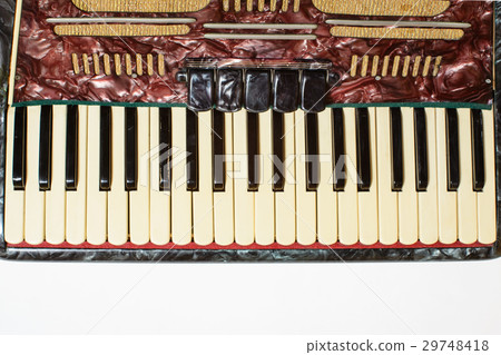 Details of an old accordion, closeup view 29748418