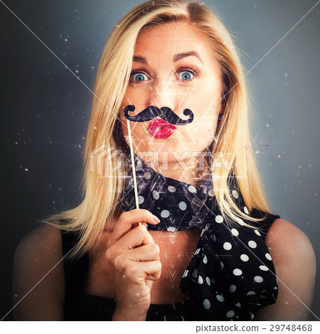 Young woman holding paper party sticks Young woman holding paper party sticks 29748468