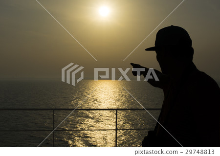 Silhouette man on sunset background 29748813