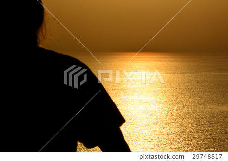 Silhouette man on sunset background Silhouette man on sunset background 29748817