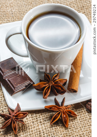 Cup of coffee with anise, chocolate and cinnamon Cup of coffee with anise, chocolate and cinnamon 29749214