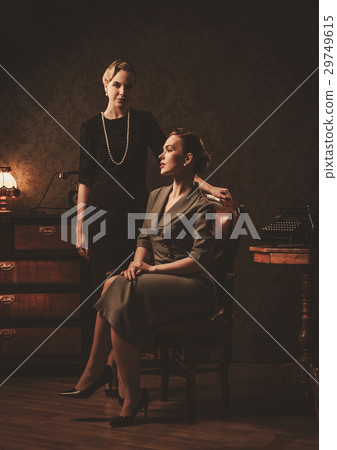 Two beautiful young women in retro interior Two beautiful young women in retro interior 29749615