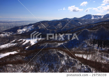 Mountain ranges near Sapporo seen from Zeniko Tengu mountain in early spring 29756339