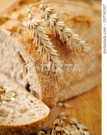 Close-up on traditional bread on wooden board 29756507