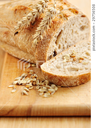 Close-up on traditional bread on wooden board Close-up on traditional bread on wooden board 29756508