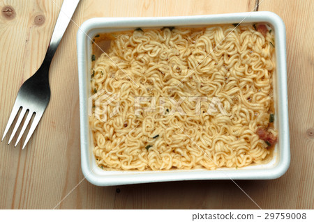 Nourishing noodles on a wooden table in a Nourishing noodles on a wooden table in a 29759008
