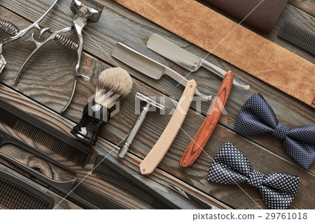 Vintage barber shop tools on wooden background Vintage barber shop tools on wooden background 29761018