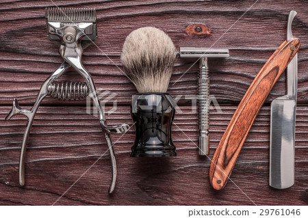 Vintage barber shop tools on wooden background Vintage barber shop tools on wooden background 29761046