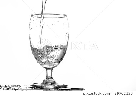 Pouring water into a glass Pouring water into a glass 29762156