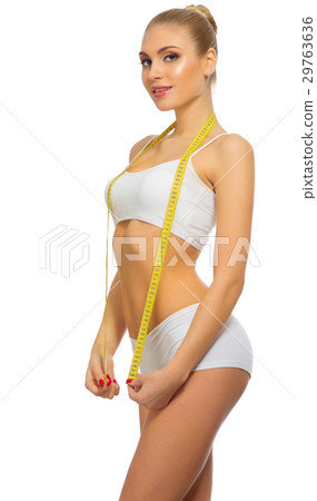 Healthy woman with measurement tape Healthy woman with measurement tape 29763636