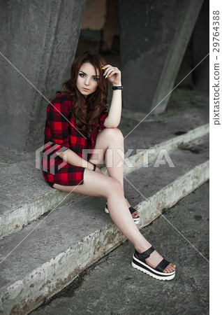 Beautiful young hipster girl posing and smiling  29764388