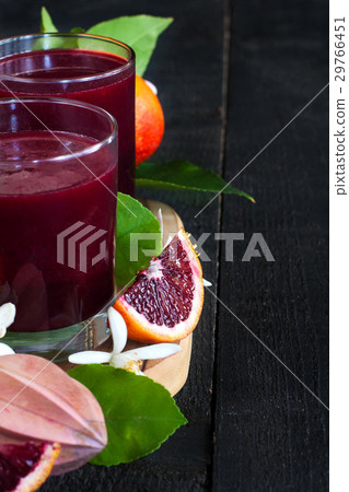 Blood orange juice background 29766451