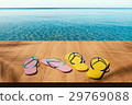 Relax at the seashore. 29769088