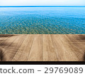 Relax at the seashore. 29769089