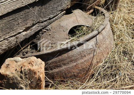 Rusty wheel disk in the yard 19667 Rusty wheel disk in the yard 19667 29770094