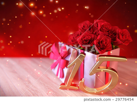 birthday concept with red roses in gift on wooden 29776454