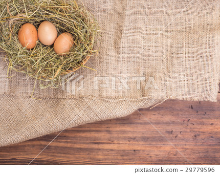 Rural eco background with brown chicken eggs, a Rural eco background with brown chicken eggs, a 29779596