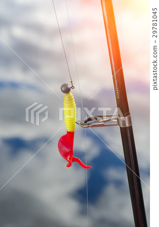 Fishing baubles closeup on the rod Fishing baubles closeup on the rod 29781045
