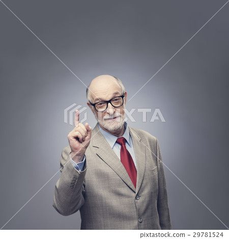 Senior man points finger up Senior man points finger up 29781524