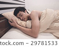 Young Asian man smiling  while sleeping 29781533