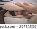 Young Asian Caucasian man on bed 29781539