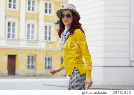 Beautiful brunette woman in chic fashion 29781839