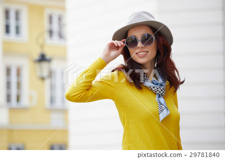 Beautiful brunette woman in chic fashion 29781840