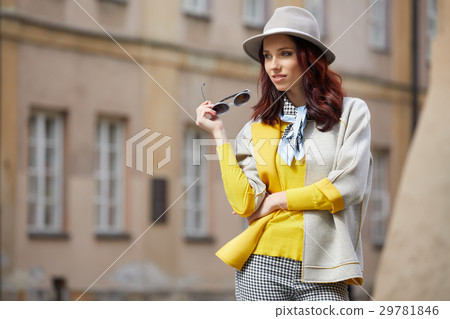 Beautiful brunette woman in chic fashion 29781846