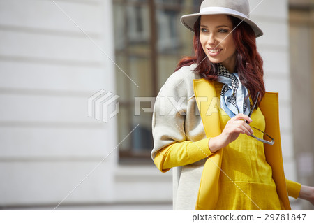 Beautiful brunette woman in chic fashion 29781847