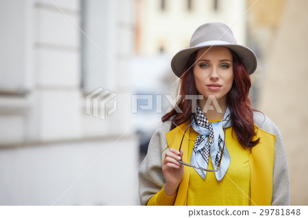 Beautiful brunette woman in chic fashion 29781848
