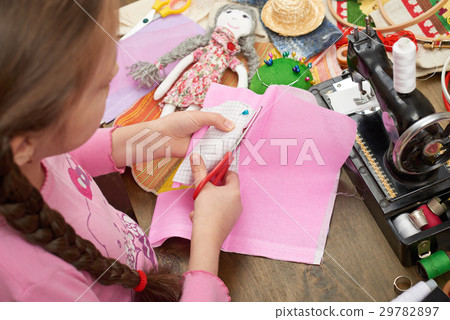 girl sews doll clothes top view sewing accessories girl sews doll clothes top view sewing accessories 29782897