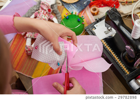 girl sews doll clothes top view sewing accessories girl sews doll clothes top view sewing accessories 29782898